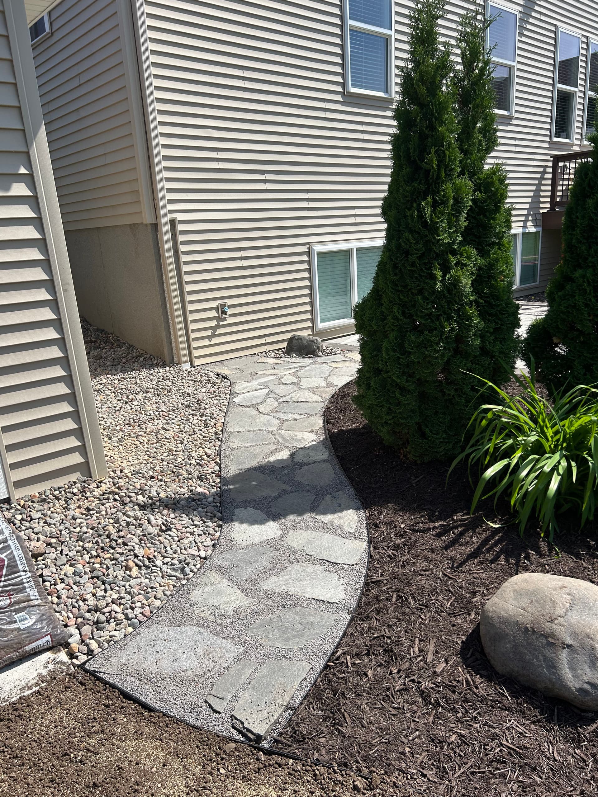 Gallery photos for Granite Flagstone Walkway and Landscaping Refresh with Dark Mulch: Image #1