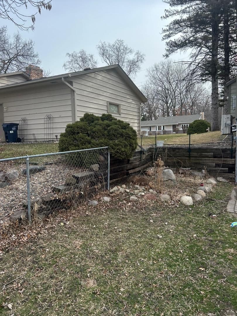 Gallery photos for Timber Wall Torn Out, Boulder Wall and Fresh Landscaping Put In: Image #1