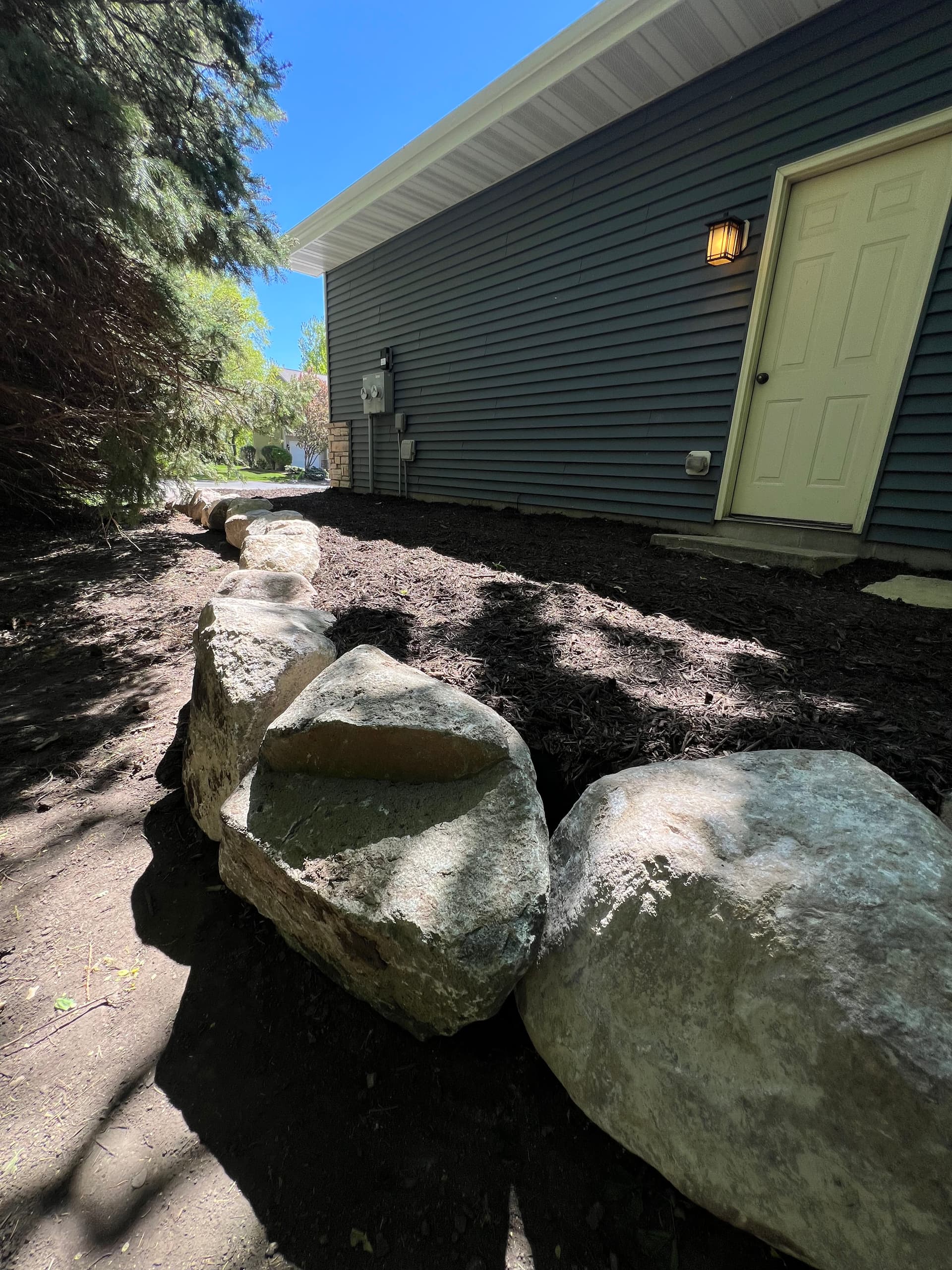 Gallery photos for Washed-Out Side Yard Fixed with Boulder Wall and Stone Path: Image #1